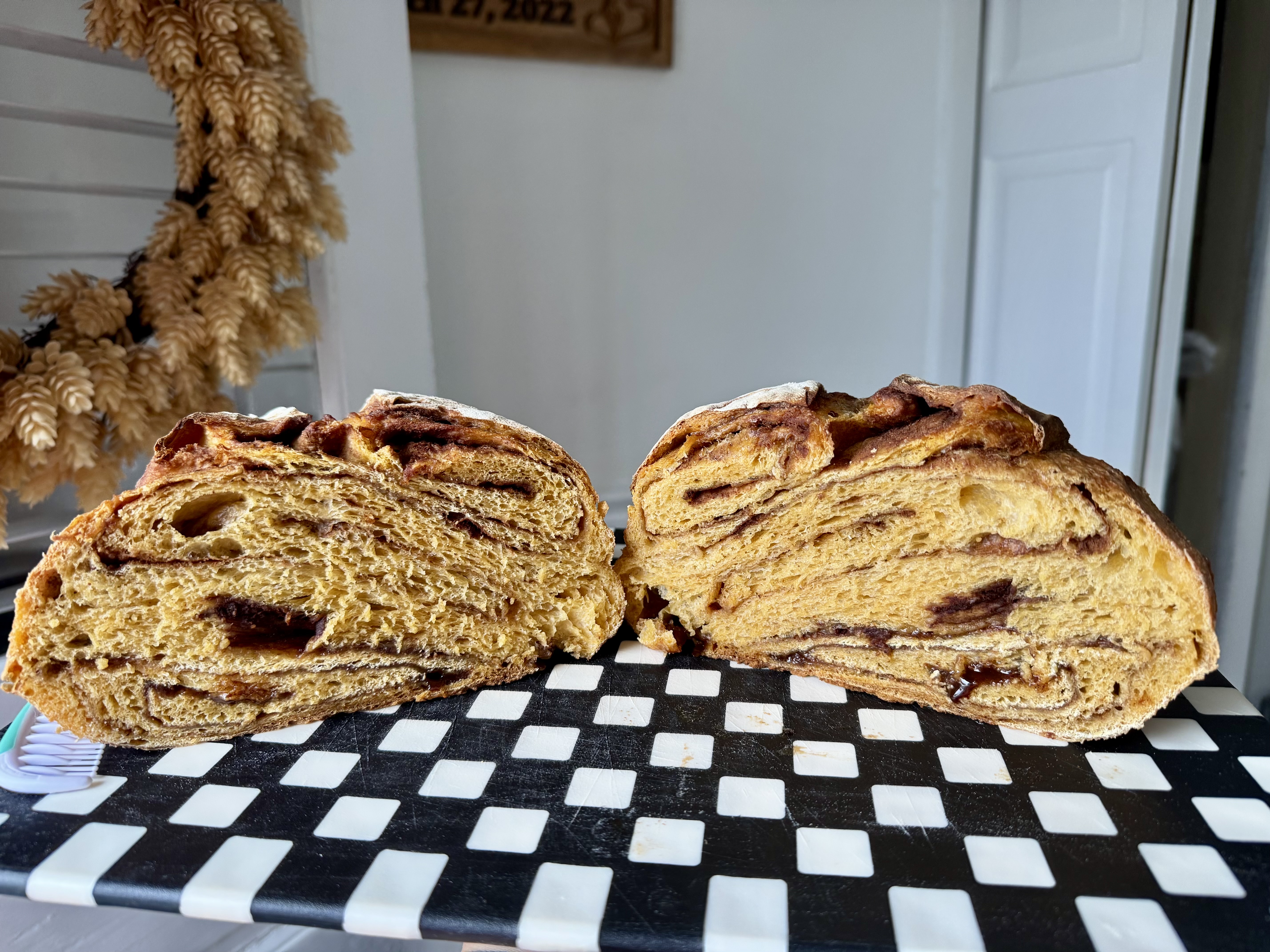 Pumpkin loaf split with orange crumb